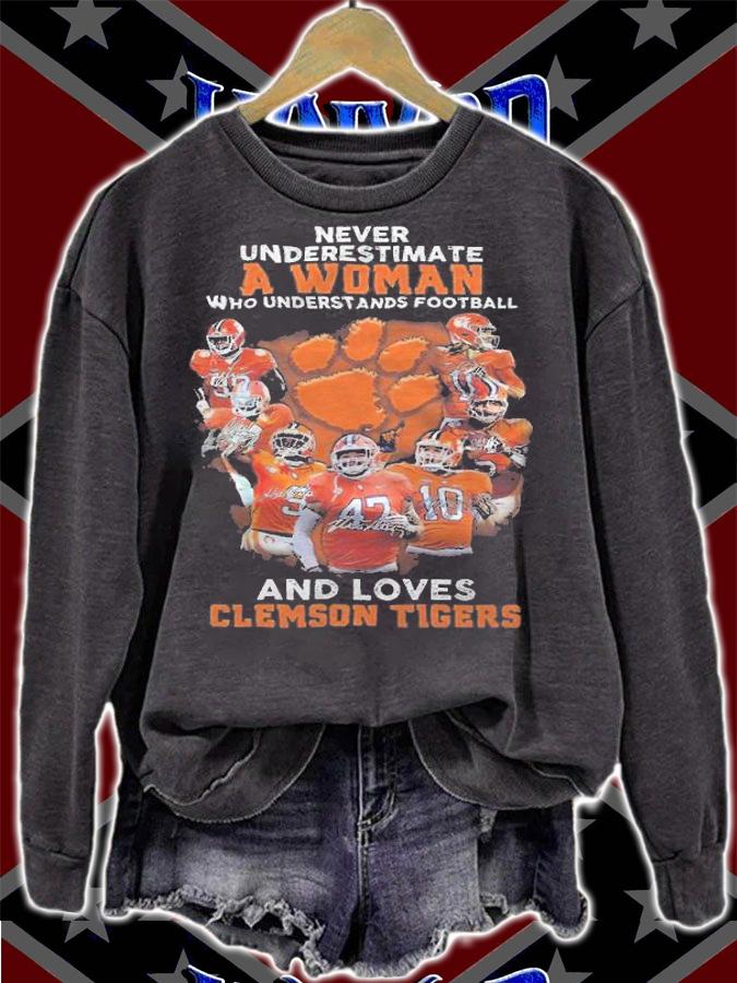 Never underestimate a woman who understands football and loves Clemson Tigers shirt sweatshirt